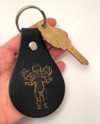 Three Headed Baby Keychain FOB Black & Gold