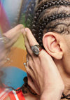 model wearing 3 headed baby signet ring statement 