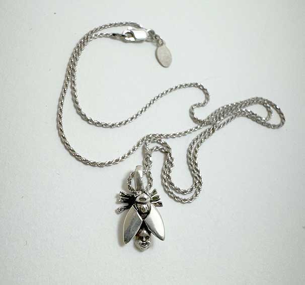 Fly with Baby Head Abdomen Necklace