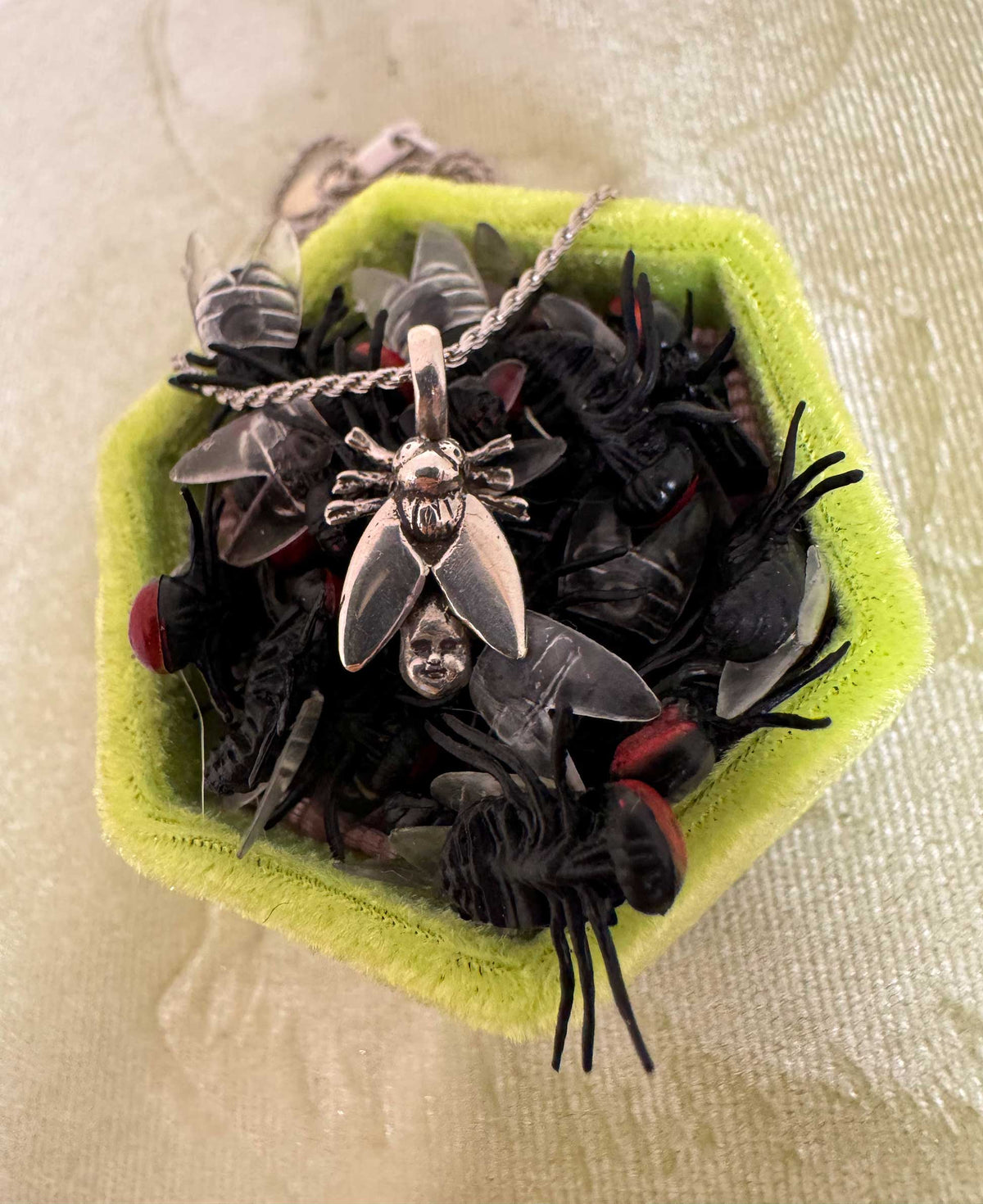 Fly with Baby Head Abdomen Necklace