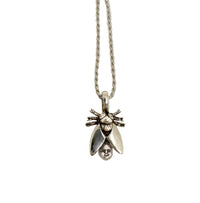 Fly with Baby Head Abdomen Necklace