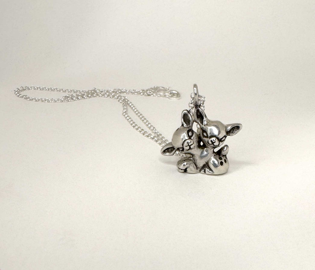 Sitting 2 Headed Deer Necklace
