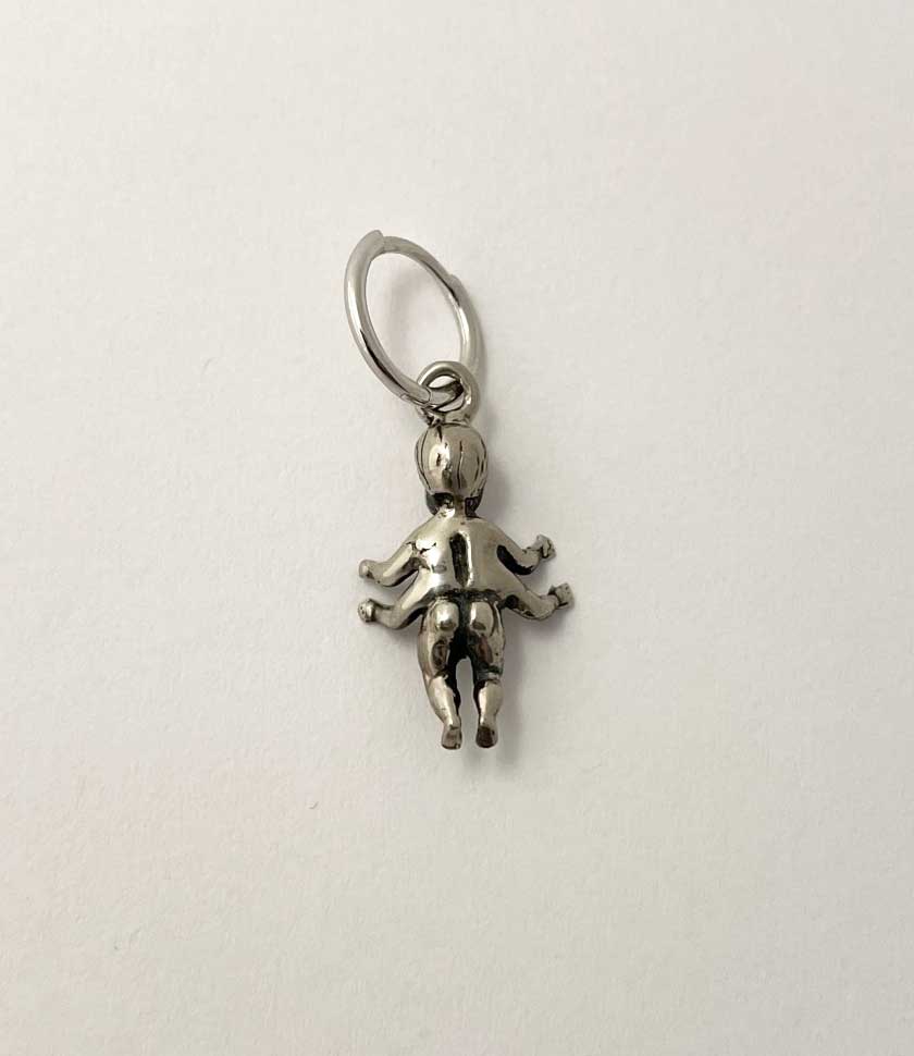 back of the baby charm four arms quirky silver 
