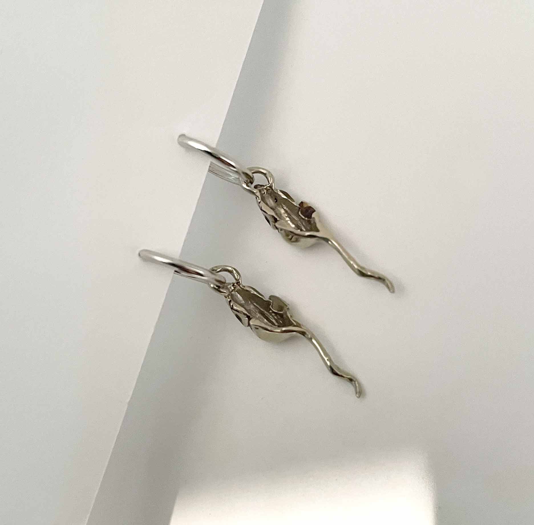 pair of mouse hoop earrings silver