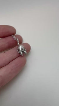 video of the two headed rat necklace in silver