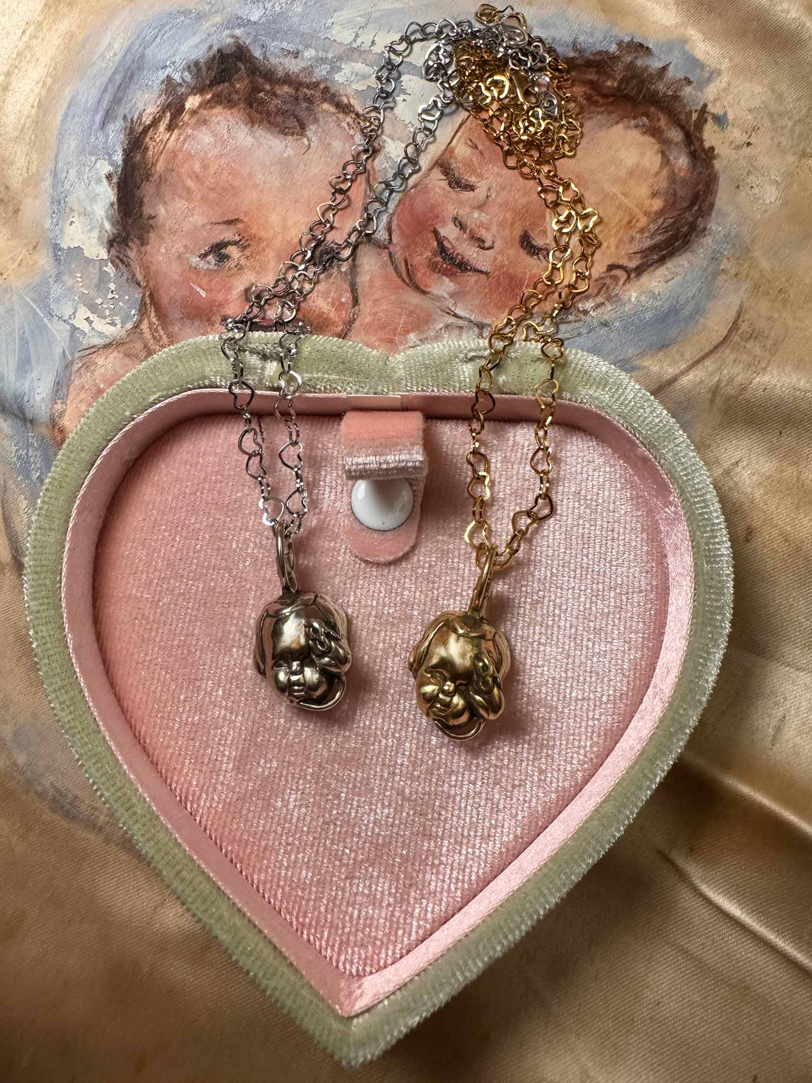 Baby Eating a Rat Necklace