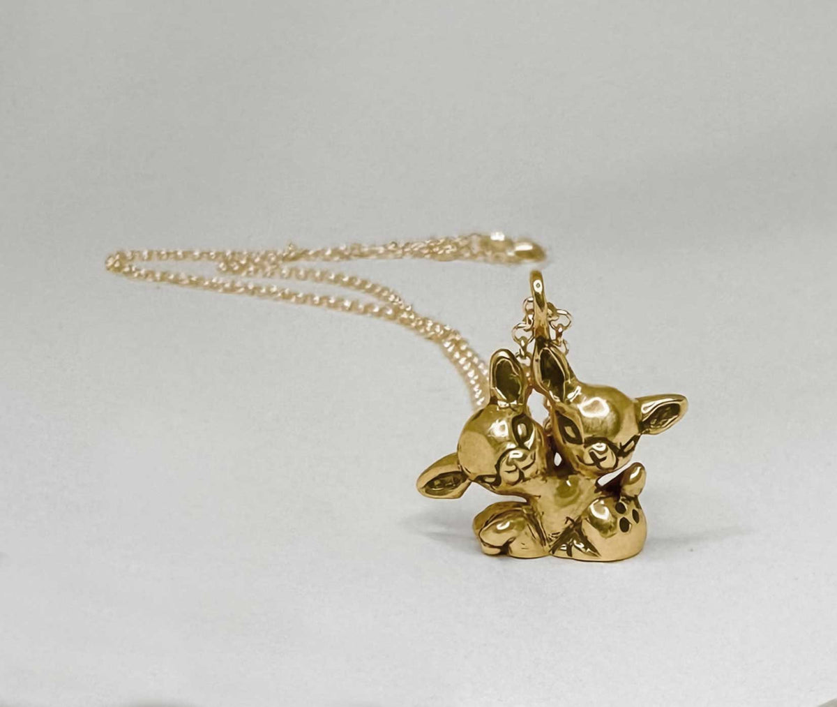 Sitting 2 Headed Deer Necklace