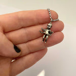 four arm baby charm silver necklace dainty quirky