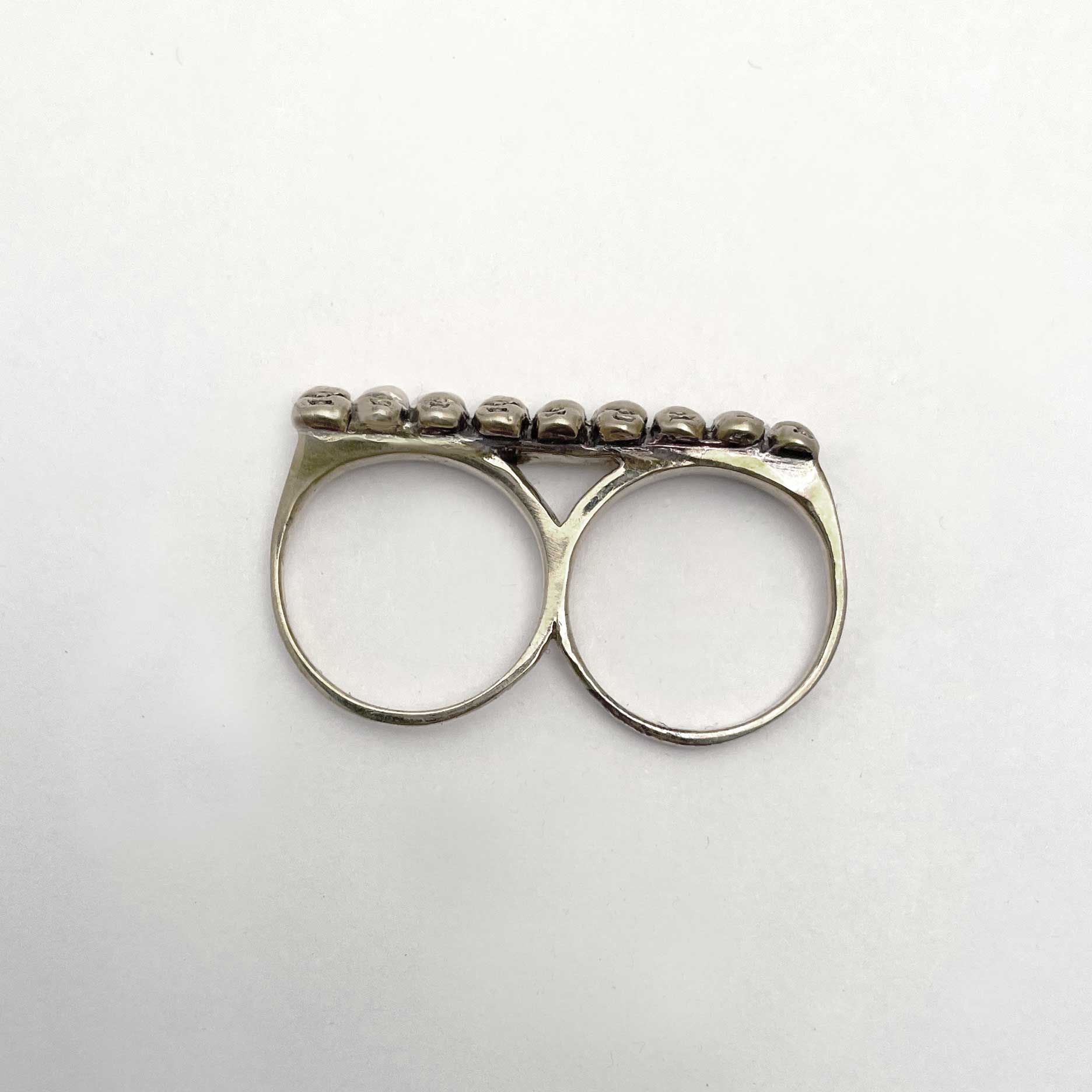 Baby Heads Knuckle Ring