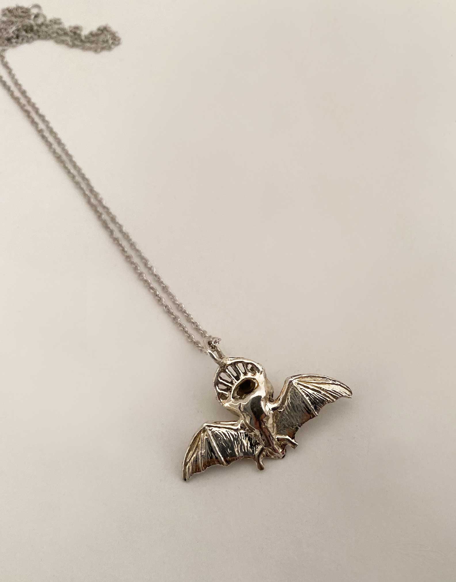 back of cat bat necklace silver
