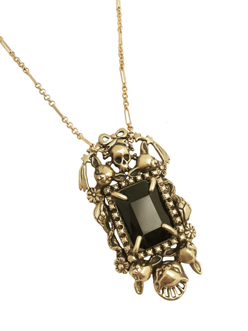 gold tone cornucopia necklace with bats skulls deer flowers stars snakes black