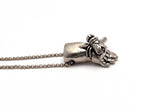 close up fly charm in silver baby hand insect
