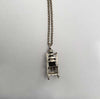 back of sitting duck in a chair necklace charm silver