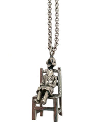 sitting duck in a chair necklace charm silver statement