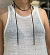 model wearing black and silver snake chain