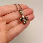 spider girl necklace charm silver in hand