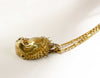 side view handmade gold baby head bad haircut necklace