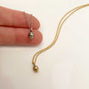 silver and gold baby head necklaces minimal and dainty small charms