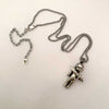 knife baby doll necklace charm silver